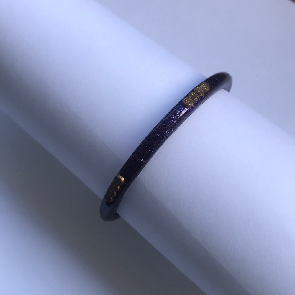 purple bangle bracelet w gold flower details